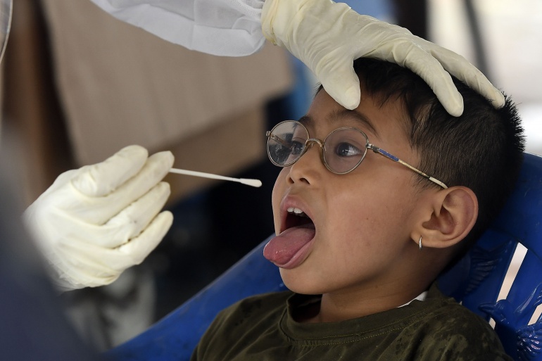 Test salivaire PRAKASH MATHEMA / AFP